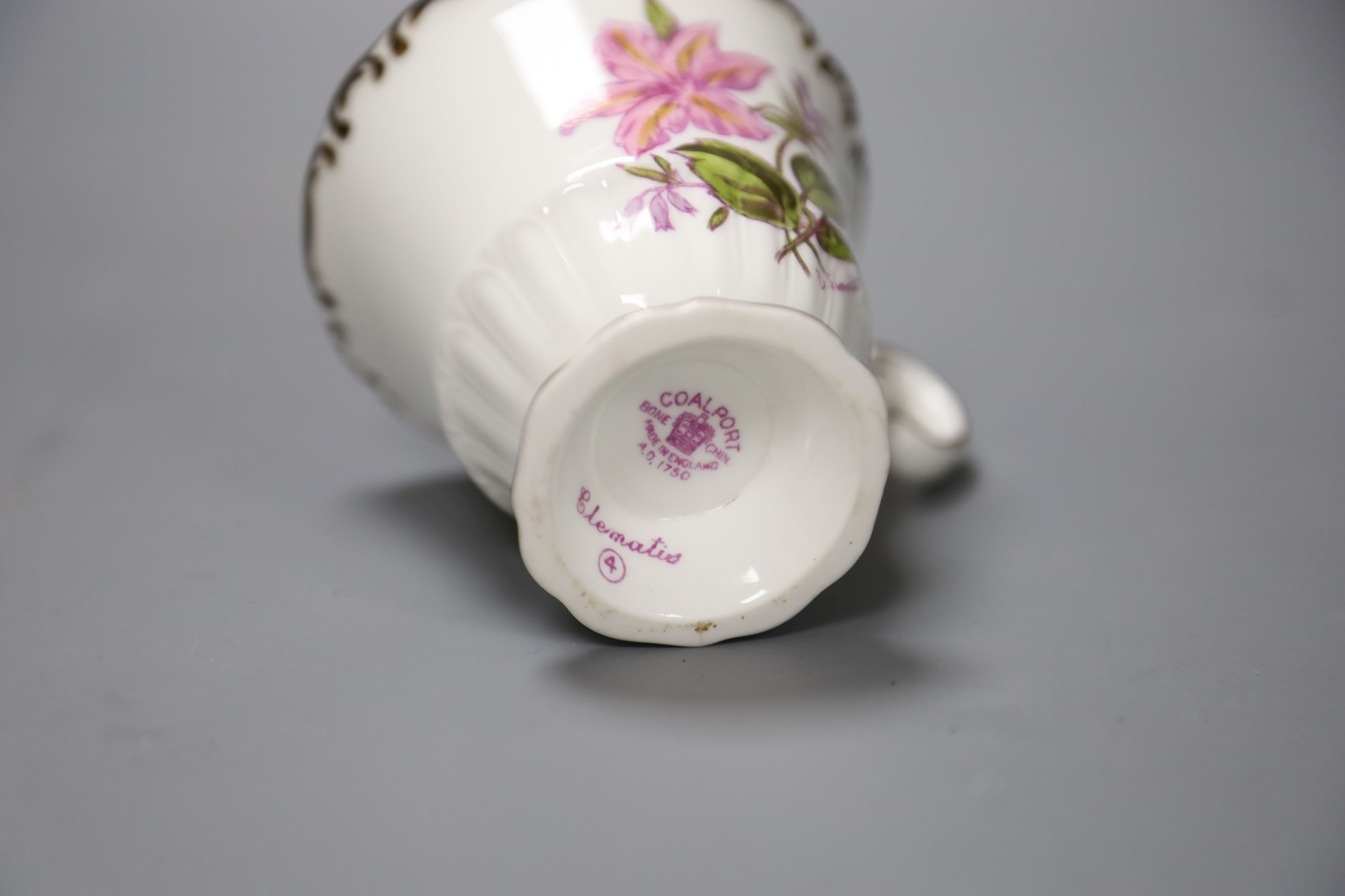 A Royal Albert Moss Rose pattern tea service (41-pce) and a set of four Coalport botanical cups and saucers